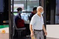 Huzhou, China June 22, 2021: Passenger waiting public transport at bus stop during Coronavirus covid-19 pandemic Royalty Free Stock Photo