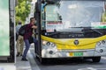 Huzhou, China June 22, 2021: Passenger waiting public transport at bus stop during Coronavirus covid-19 pandemic Royalty Free Stock Photo