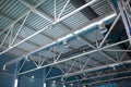 HVAC Duct Cleaning, Ventilation pipes in silver insulation material hanging from the ceiling inside new building Royalty Free Stock Photo