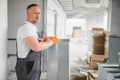 hvac services - worker install ducted pipe system for ventilation and air conditioning in office. Royalty Free Stock Photo