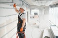 hvac services - worker install ducted pipe system for ventilation and air conditioning in office. Royalty Free Stock Photo