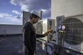 HVAC technician checking amperage Royalty Free Stock Photo