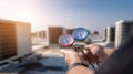 The HVAC technician measuring pressure with gauges on a rooftop system. AI generated image Royalty Free Stock Photo