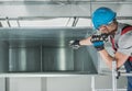 HVAC Technician Performing Scheduled Air Heating and Cooling System Checkup Royalty Free Stock Photo
