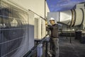 HVAC technician servicing mini-split air conditioners Royalty Free Stock Photo