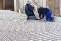 HVAC technicians working on underfloor heating system installation. Close up on water floor heating system interior Royalty Free Stock Photo