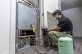 HVAC worker checking refrigerant Royalty Free Stock Photo