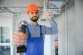 hvac worker install ducted pipe system for ventilation and air conditioning. copy space Royalty Free Stock Photo