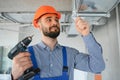 hvac worker install ducted pipe system for ventilation and air conditioning. copy space Royalty Free Stock Photo