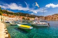 Hvar town with seagull's flying over city, famous luxury travel destination in Croatia. Boats on Hvar island, one of the many Royalty Free Stock Photo