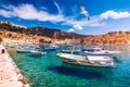 Hvar town with seagull's flying over city, famous luxury travel destination in Croatia. Boats on Hvar island, one of the many Royalty Free Stock Photo