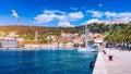 Hvar town with seagull\'s flying over city, famous luxury travel destination in Croatia. Boats on Hvar island, one of the many Royalty Free Stock Photo