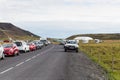 Car parking at roadside of country road in Iceland