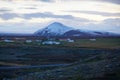 Hverfjall crater covered in snow on Iceland lake Royalty Free Stock Photo