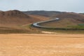 Hverir, geothermal area Namafjall, S-shaped road and colored surface, North of Iceland Royalty Free Stock Photo