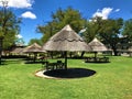 Hwange Safari Lodge outdoor thatched roof seating area Zimbabwe