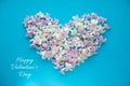 Hyacinth flowers on blue background with heart