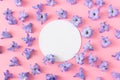 Hyacinth flowers on a pink background. Round blank frame for text on coaster