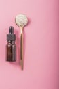 Hyaluronic acid bottle. Collagen solution and collagen powder in spoon Royalty Free Stock Photo