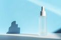 Hyaluronic acid oil tincture. Transparent liquid emulsion in glass bottle with dropper. Serum with collagen and peptides