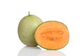 Hybrid cantaloupe honeydew melon sliced with seeds Royalty Free Stock Photo