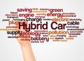 Hybrid car word cloud and hand with marker concept Royalty Free Stock Photo