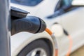 Hybrid electric car charging at plug in station Royalty Free Stock Photo