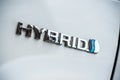 Hybrid logo on white Toyota Prius car