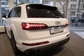 hybrid SUV Car Audi e-tron Q7 quattro, taillights, white multi-drive vehicle in showroom rear view, Sustainable Mobility,