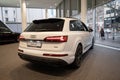 hybrid SUV Car Audi e-tron Q7 quattro, taillights, white multi-drive vehicle in showroom rear view, Sustainable Mobility,