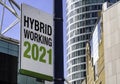 Hybrid Working 2021 sign in a downtown city center