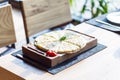 Hychiny, tortilla dough with cheese and potatoes, on cutting board Royalty Free Stock Photo