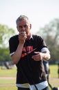 HYDE PARK, LONDON, ENGLAND- 24 April 2021: Heiko Khoo speaking at Speakers` corner