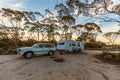 Hyden, Australia - Mar 19,2021: A large white caravan and modern 4WD vehicle in the late afternoon at the free camp at Holt Rock Royalty Free Stock Photo