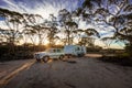 Hyden, Australia - Mar 19,2021: A large white caravan and modern 4WD vehicle in the late afternoon at the free camp at Holt Rock Royalty Free Stock Photo