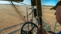 HYDEN, WESTERN AUSTRALIA, AUSTRALIA- NOVEMBER 4, 2015: a inside the cab view of a farmer driving a harvester on a farm