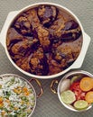 Hyderabad cuisine Eggplant curry with fried rice & salad Royalty Free Stock Photo