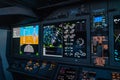 flight deck of the modern Boeing 737-8 MAX airplane with large primary flight display, navigation display and engine instrument Royalty Free Stock Photo