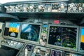 Flight deck of the modern Boeing 737-8 MAX airplane with large primary flight display, navigation display and engine instrument Royalty Free Stock Photo