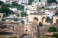 Aerial view of the historic buildings of the Golconda fort with the urban neighborhood around
