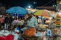 An Indian street vendor selling sweets in the crowded market at Charminar in old Hyderabad Royalty Free Stock Photo
