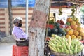 Hyderabad, Telangana, India. july-20-2020: old aged fruits trader selling fruits while wearing face mask, senior
