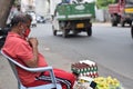 Hyderabad, Telangana, India. july-20-2020: old aged man selling eggs and lemons at road side while wearing face mask, senior man