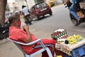 Hyderabad, Telangana, India. july-20-2020: old aged man selling eggs and lemons at road side while wearing face mask, senior man