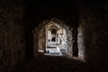 Stone arches in a tunnel corridor in the ruins of the ancient historic Golconda fort