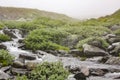 Hydnefossen waterfall and Hydna river, VeslehÃÂ¸dn Veslehorn mountain, Hemsedal, Norway Royalty Free Stock Photo