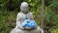 Hydrangeas and Jizo bosatsu Royalty Free Stock Photo