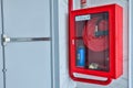 Hydrant with water hoses and fire extinguish equipment. Fire safety equipment in the red box on wall cement Royalty Free Stock Photo