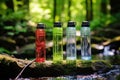 hydration bottles filled with cool water on a hiking trail Royalty Free Stock Photo