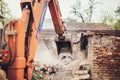 Hydraulic crusher excavator backhoe machinery working on site demolition